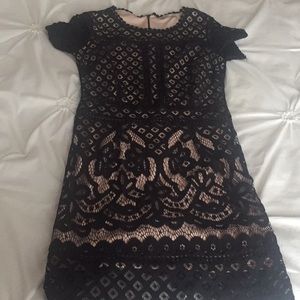 Classic black and nude lace dress